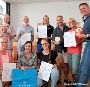 Die Pokalgewinner sowie ein Teil der aktivsten Einzelfahrerinnen und -fahrer während der Siegerehrung, 1. Reihe 2.v.l. Heide Niemann, Klimaschutzbeauftragte der Hansestadt Stralsund